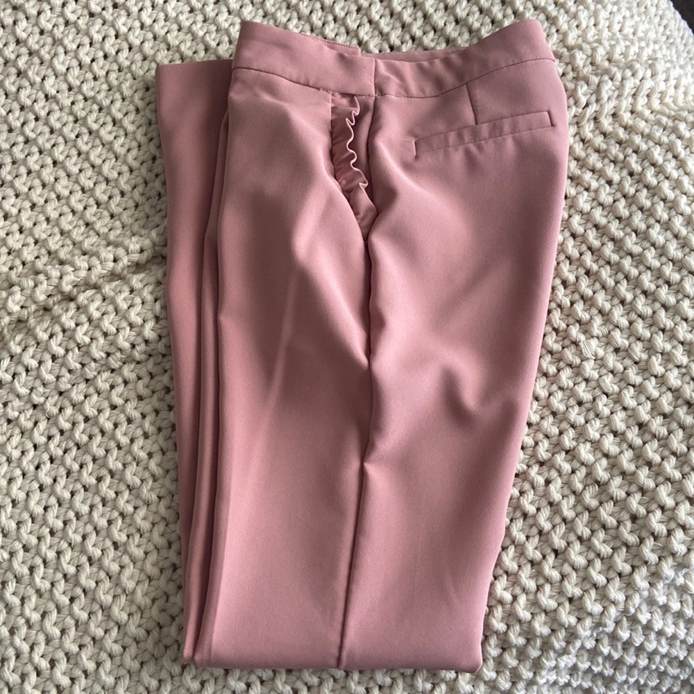 Pink straight leg pants.